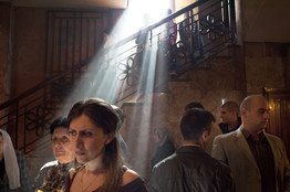 Worshipers lighted candles at a church service in Yerevan, Armenia